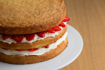 Victoria Sponge Cake with Whipped Cream and Strawberry