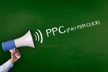 Hand Holding Megaphone with PPC (PAY PER CLICK) Announcement