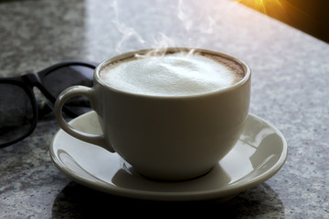 Milk coffee on the table.
