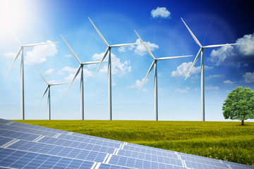 Photovoltaics solar panels and wind turbines generating alternative energy 