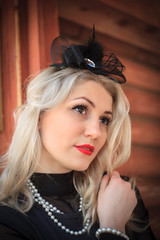 Outdoor fashion portrait woman, vintage close up, red lips.