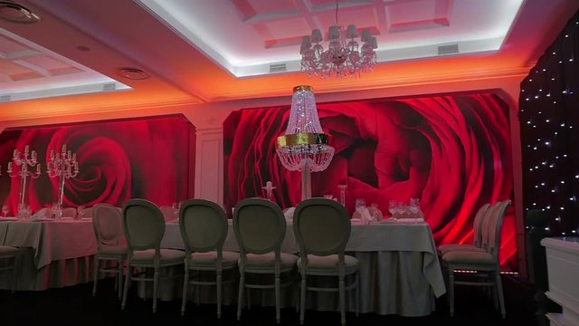 Banquet hall waiting for guests, Large empthy banquet hall. Ready for the holiday banquet hall. Steadicam shot.