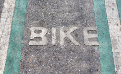 bike sign text on the road for safety biker