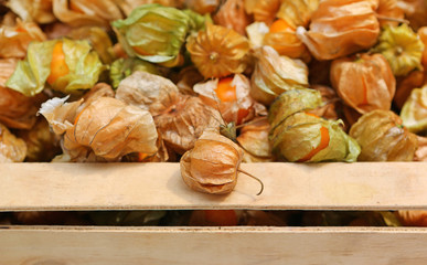 Gooseberry in wooden tray