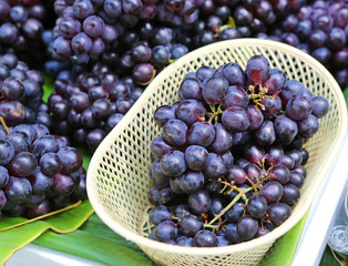 Grape in white basket on the market