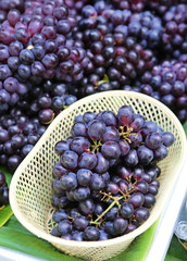 Grape in white basket on the market