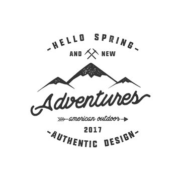 Vintage adventure Hand drawn label design. Hello spring and new adventures sign and outdoor activity symbols - mountains, climb gears. Monochrome. Isolated on white background. Vector