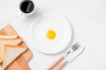 Traditional breakfast with fried eggs on a plate