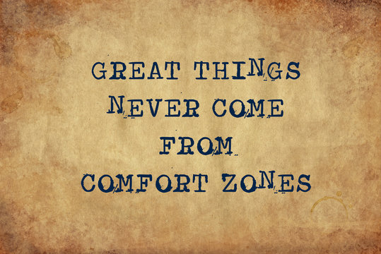 Inspiring motivation quote of great things never come from comfort zones with typewriter text. Distressed Old Paper with Typing image.