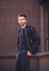 portrait of a young man with trendy clothes