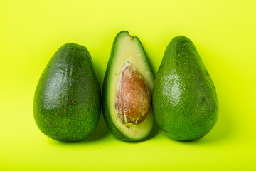 avocado on yellow background
