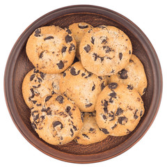 Cookies with chocolate in a brown plate. Isolated on white background.