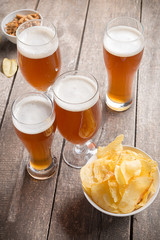 glass beer on wood background