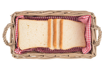 White bread in basket. Slice. Isolated on white background.