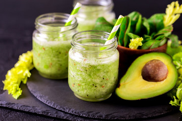 Green smoothie with avocado, spinach and celery. Healthy food