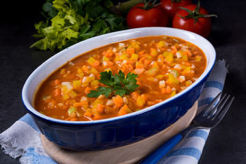 fish with vegetables in tomato sauce
