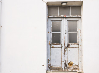 A front entrance of a home with a door
