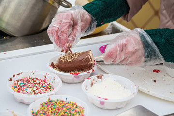 Making chocolate dipped bananas