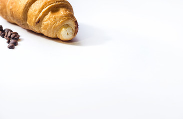 croissant, nd coffee beans on white background,