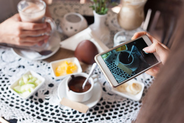 people, technology, eating and dating concept - close up