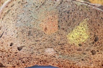 Close up molded rye bread background texture