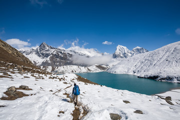 Man is trekking near Gokyo lake in Everest region, Nepal