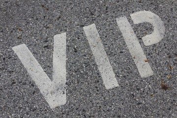VIP service symbol with a first class reserved parking with a blank area for text.
