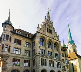 Fototapeta na wymiar City Hall Stadthaus and Fraumunster Church in Zurich