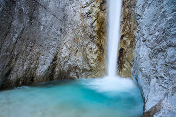 Scenic mountain waterfall in Triglav national park in Julian Alps, Slovenia