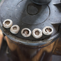 Grilled mushrooms on a Heating Stove in a Country House in a Small Town of Anatolia