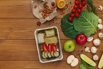 Healthy food take away in box, background on wood