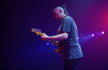 Guitarist performing on stage. Concert.