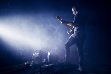 Guitarist performing on stage. Concert.