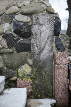 Concrete sculptures of female figures in the sculptor house