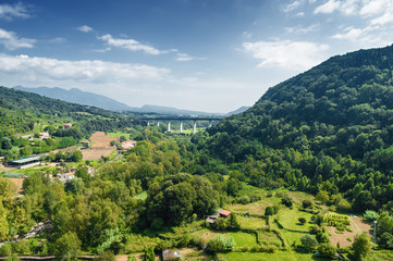 Fototapeta premium Sunny view from tower of church at Castelfollit de la Roca, La Garrotxa province, Catalonia, Spain.