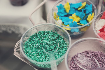 Ice cream and cupcakes sprinkle non pareil toppings and decorations