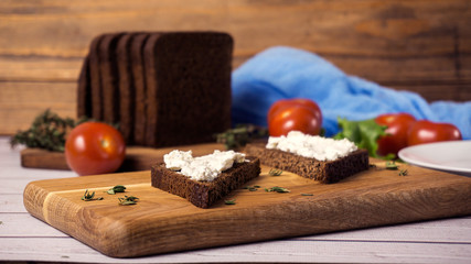 Healthy Snacks Sandwiches with goat cheese, salad, cherry tomatoes