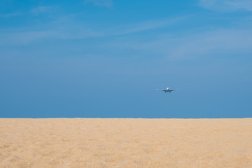 airplane over the beach
