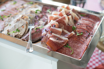Plate with various kinds of meat. salami