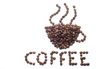 Word coffee made of beans over white background