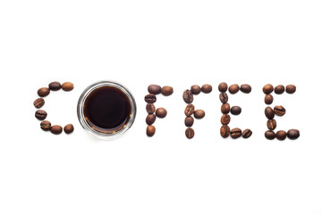 Word coffee made of beans over white background