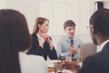 Business meeting. Young multiethnic team in modern office