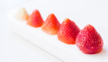 Concept and idea. Graph growth with closeup strawberries shape.