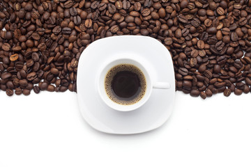 Cup of coffee with beans over half white background