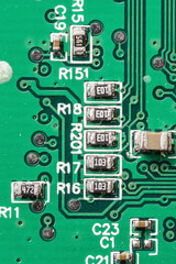 Electronic components on the printed circuit board.