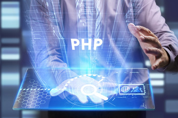 Business, Technology, Internet and network concept. Young businessman working on a virtual screen of the future and sees the inscription: PHP