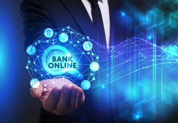 Business, Technology, Internet and network concept. Young businessman working on a virtual screen of the future and sees the inscription: Bank online