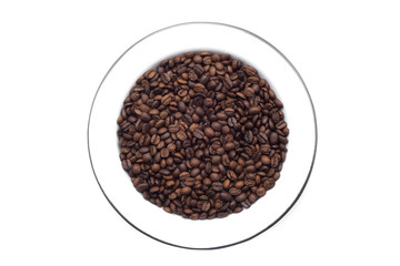 Plate with coffee beans over white background