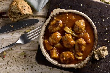 spanish albondigas con sepia, meatballs with cuttlefish