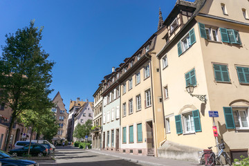 Fototapeta na wymiar STRASBOURG, FRANCE - August 23, 2016 : Street view of Traditional houses in Strasbourg, Alsace. is the official seat of the European Parliament, Located close to the border with Germany